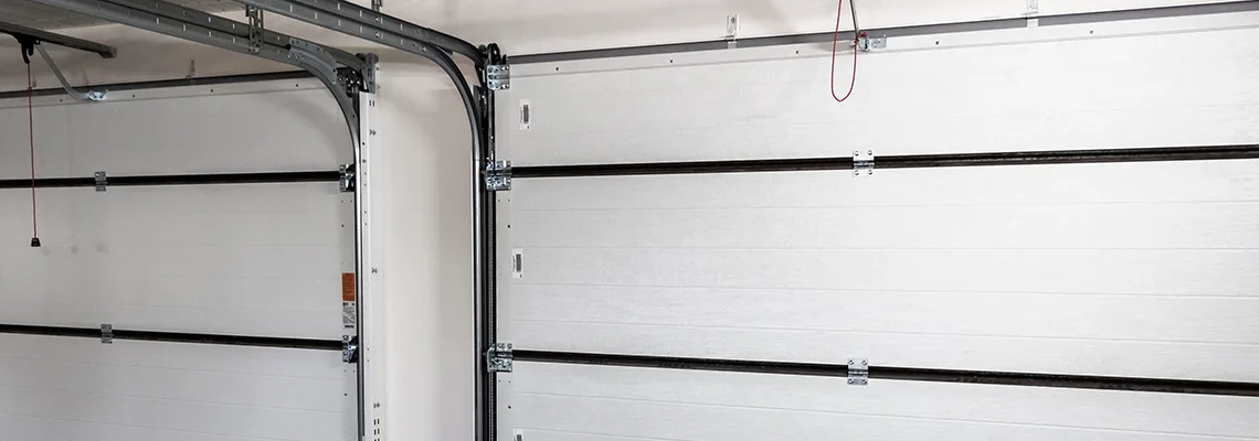 Fix Folding Garage Door Jerking in Joliet, Illinois