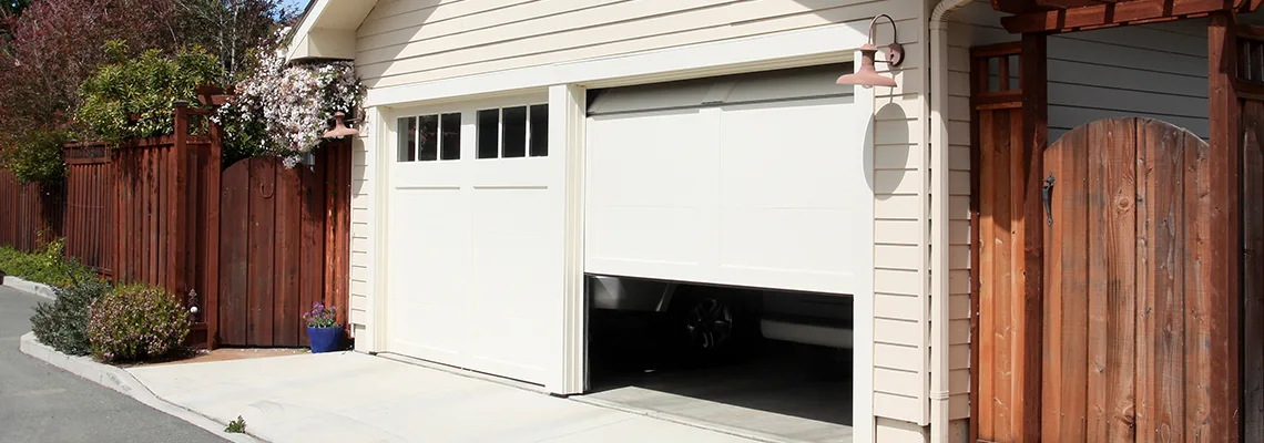 Fix Metal Garage Door Jerking in Joliet, Illinois